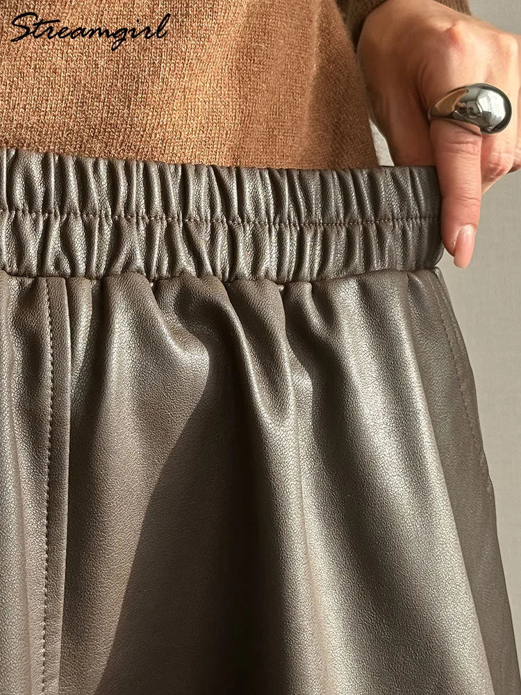 Midi Faux Leather A-Line Skirt - Elastic Waist Pocket Swing Skirt